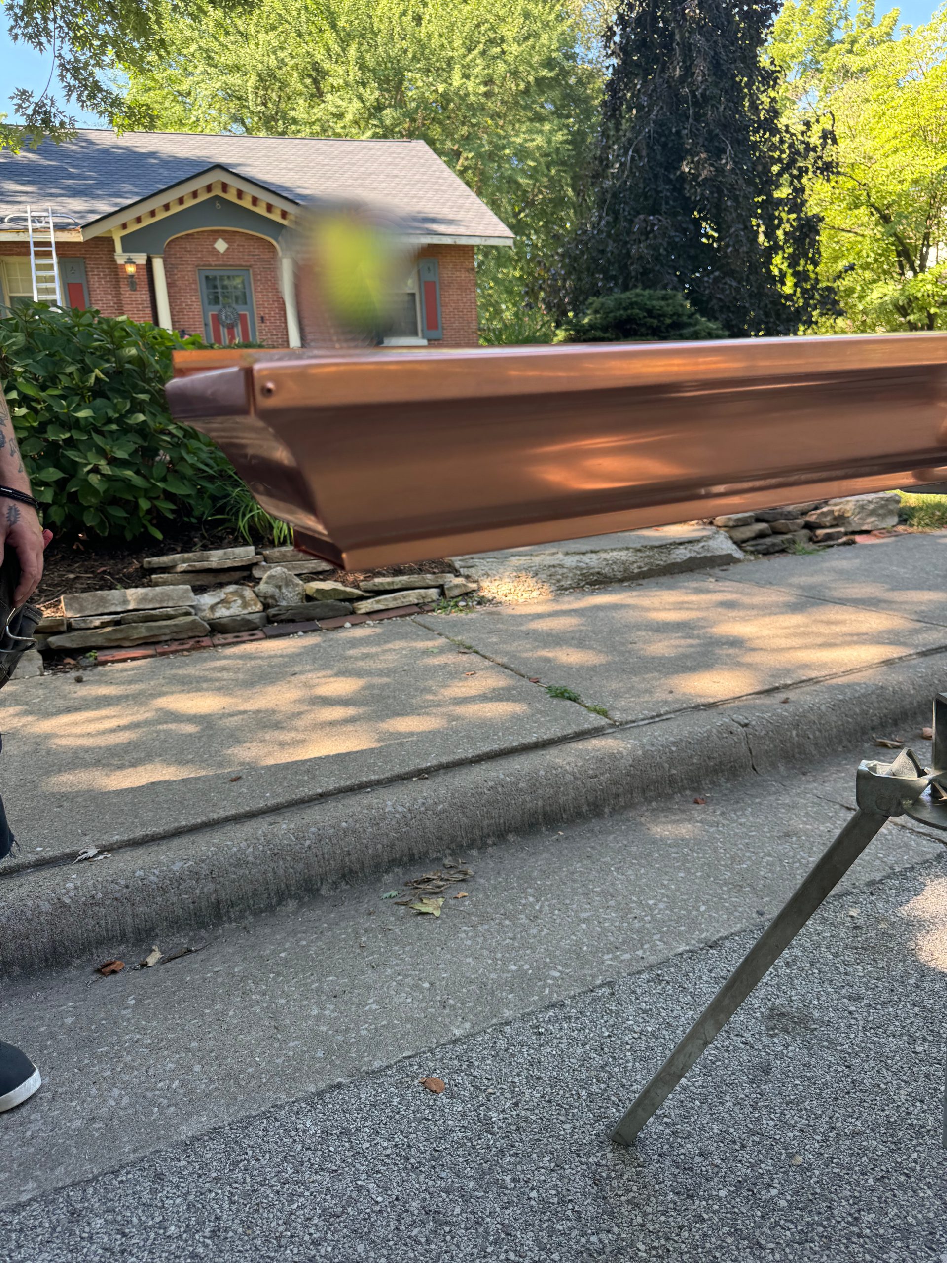 Custom Copper Gutter being soldered before installation in the city of Belleville, Illinois.